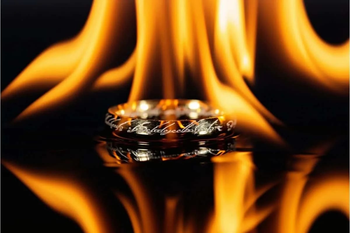 Close-up of the One Ring from Lord of the Rings with glowing Elvish inscription and fiery reflections for trivia quiz