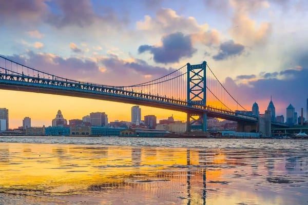 Philadelphia skyline at sunset featuring iconic architecture and scenery where famous movies were filmed in Philadelphia