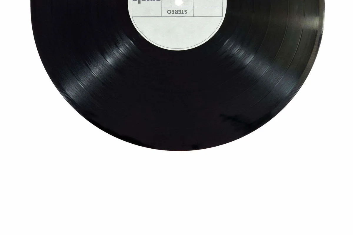 High-quality black vinyl record for vintage music lovers and collectors. Perfect for analog sound enthusiasts.