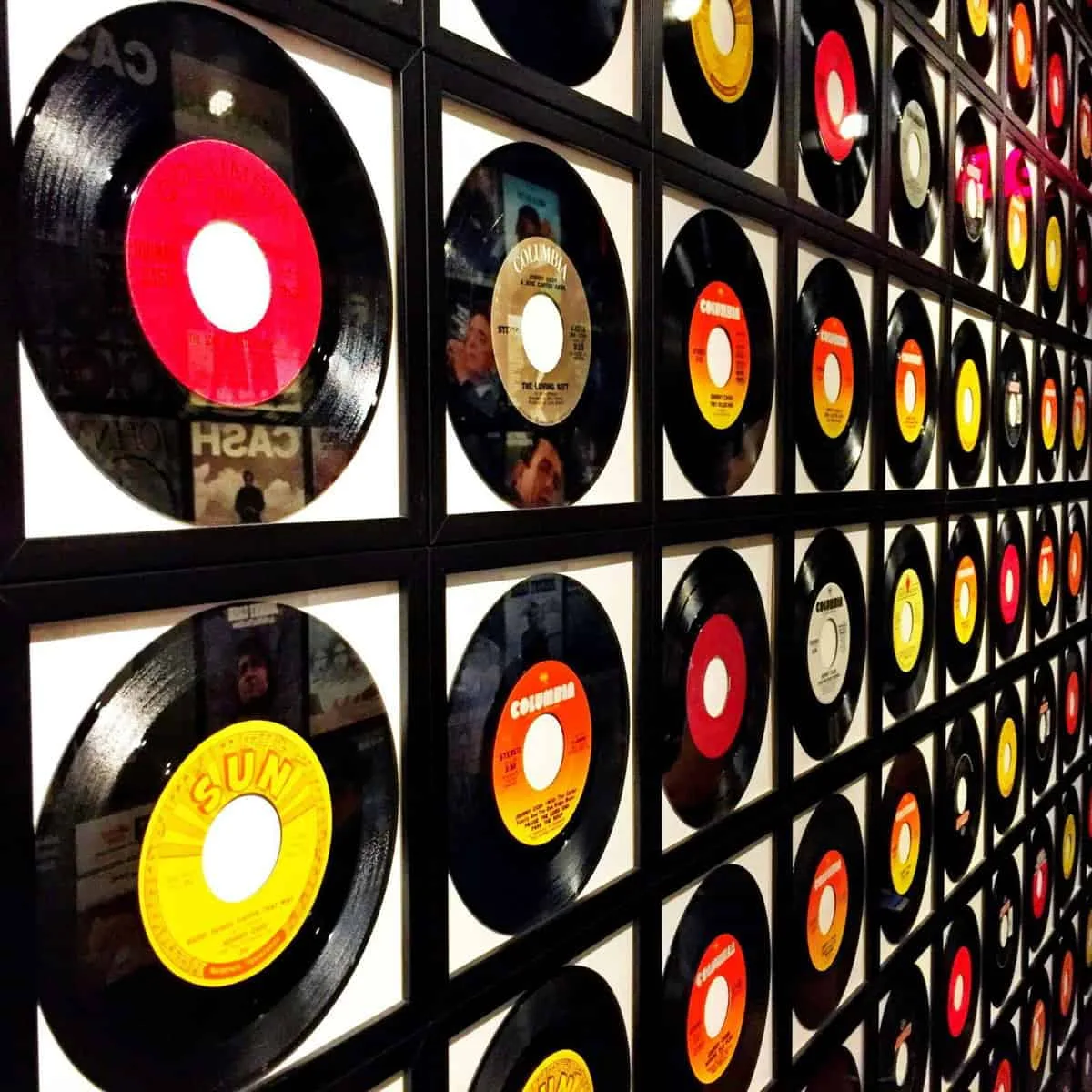 Vintage vinyl records display wall for music enthusiasts and retro home decor.